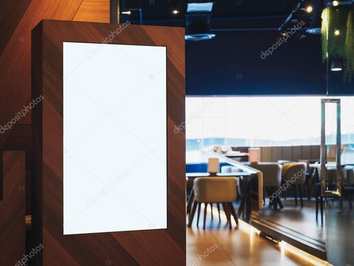 Coffee shop counter with digital menu boards and speakers