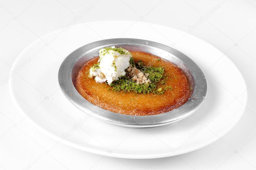 Kunefe dessert with syrup